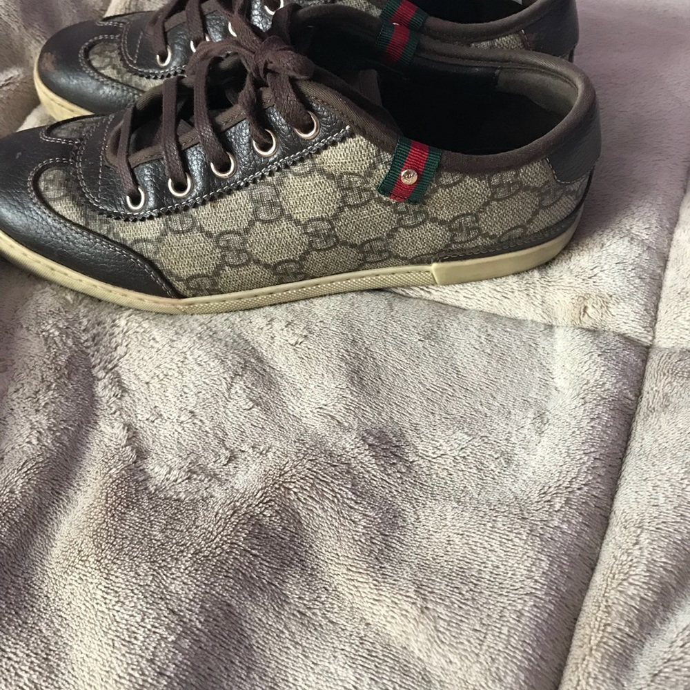 worn out Gucci sneakers
